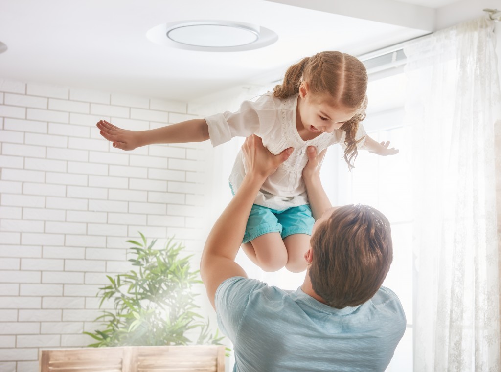 Father playing with his daughter