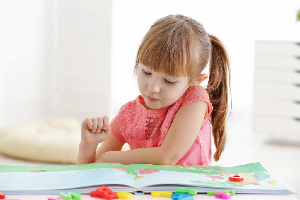 child reading a book