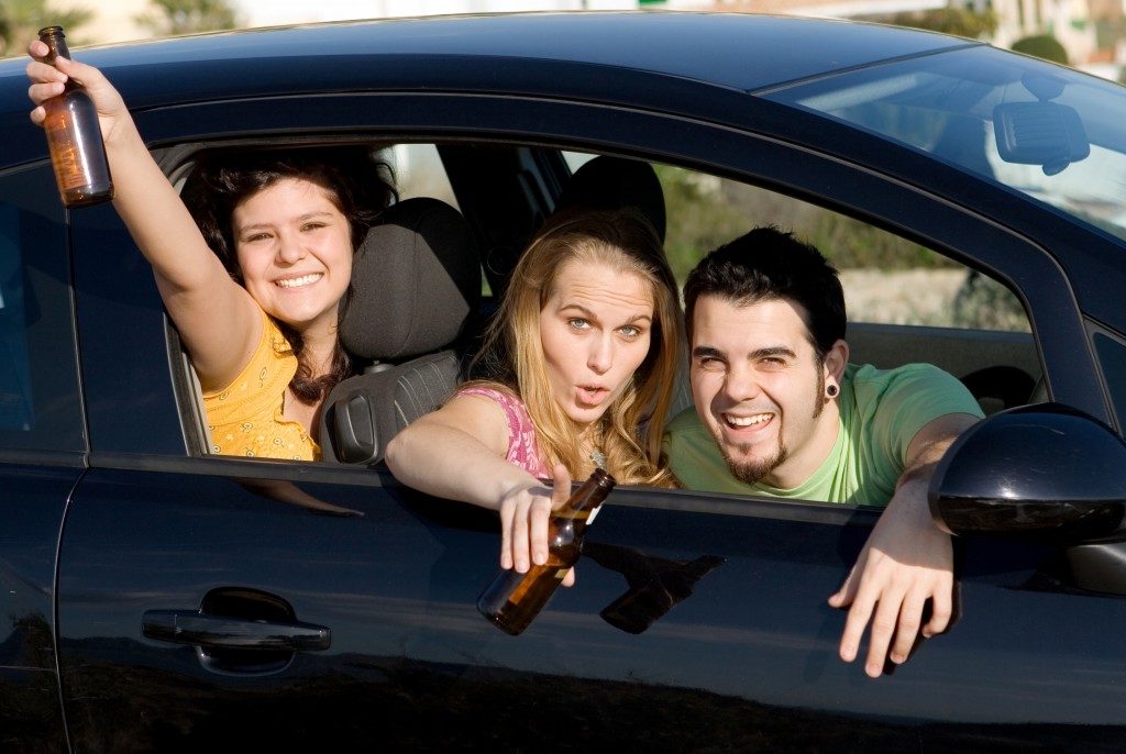 Teens drinking in the car