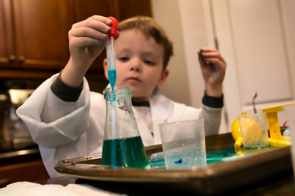 boy in a lab coat